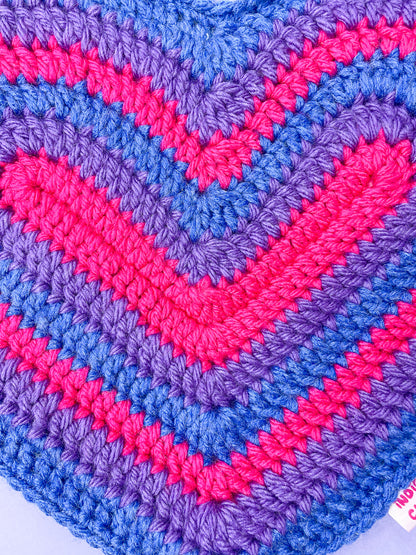 Close view of a bisexual flag heart bag showing the crochet stitch detailing.