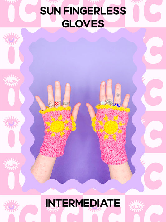 Pattern cover of a pair of hands wearing a pink crochet fingerless gloves with yellow suns on them with text saying 'sun fingerless gloves' and the skill level 'intermediate'.